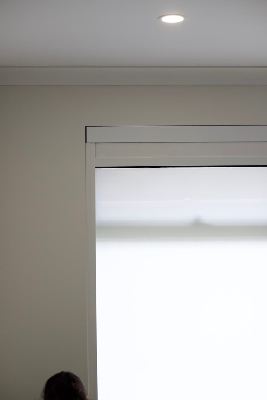 Close-up of the headrail and pelmet at the top of a blackout blind.