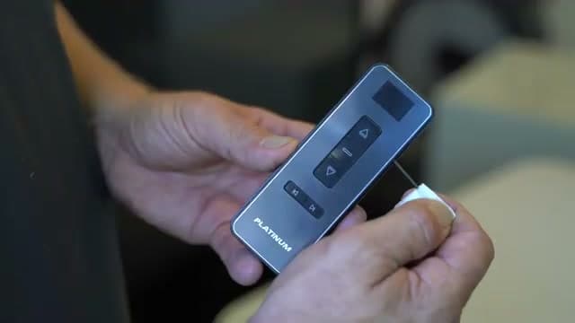 Holding the program button on the motor head until it jiggles, then pressing Up