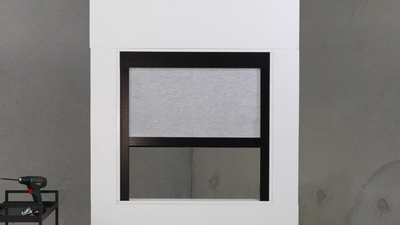 Photo: the finished blind closed, room in the dark.